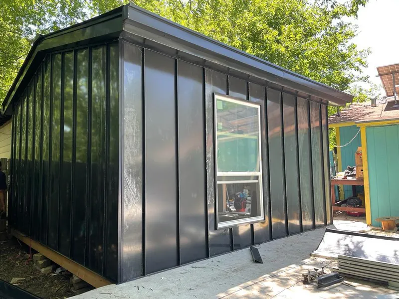 Black standing seam metal wall panels for Metal Roof Installation in South Barrington